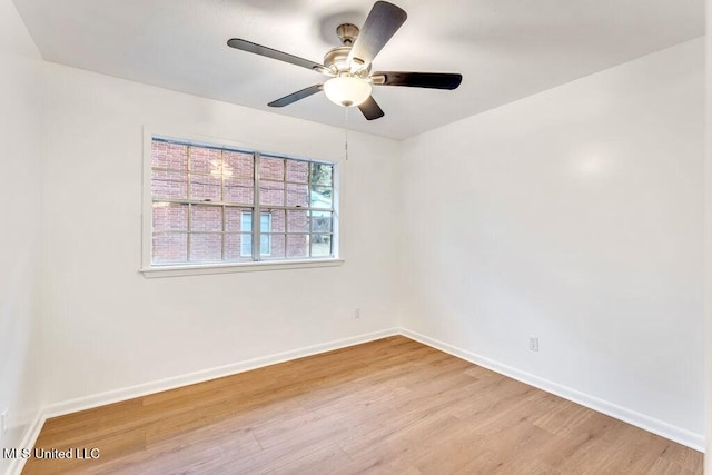 spare room with ceiling fan and light hardwood / wood-style floors