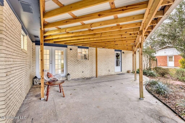 view of patio / terrace featuring french doors