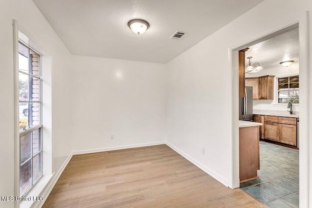 empty room featuring light wood-type flooring