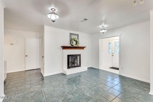 unfurnished living room featuring tile patterned flooring, crown molding, and a brick fireplace