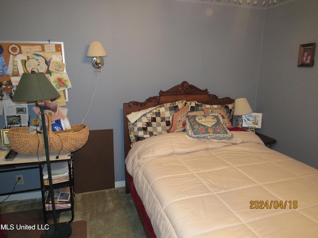 bedroom featuring carpet