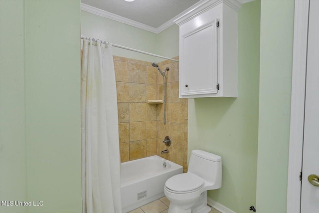 bathroom with tile patterned flooring, toilet, ornamental molding, baseboards, and shower / bath combo