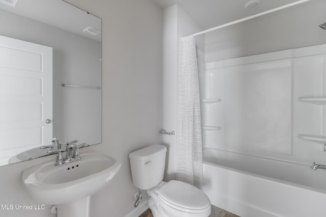 2016 Carondelet St, Ocean Springs, MS 39564 - full bathroom with shower / tub combo with curtain and toilet