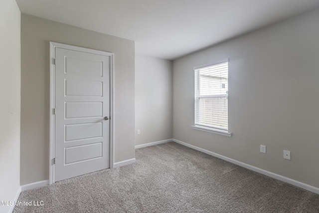 2016 Carondelet St, Ocean Springs, MS 39564 - unfurnished room with carpet floors and baseboards