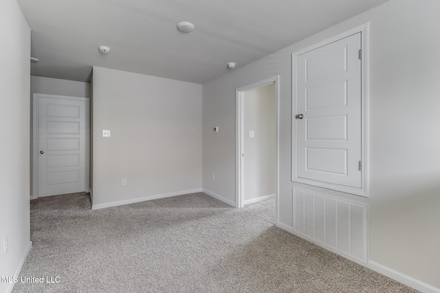 2016 Carondelet St, Ocean Springs, MS 39564 - spare room featuring carpet and a smoke detector