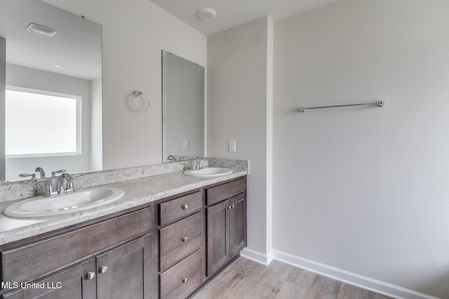 2016 Carondelet St, Ocean Springs, MS 39564 - full bath with double vanity and wood finished floors