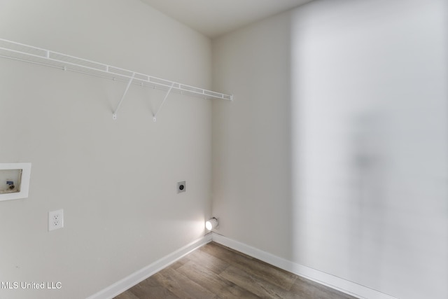 2016 Carondelet St, Ocean Springs, MS 39564 - laundry room featuring electric dryer hookup, washer hookup, and dark wood-style floors