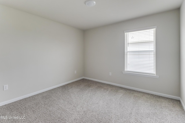 2016 Carondelet St, Ocean Springs, MS 39564 - spare room with baseboards and carpet floors