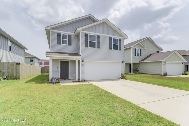 2016 Carondelet St, Ocean Springs, MS 39564 - view of front facade featuring board and batten siding, an attached garage, and concrete driveway