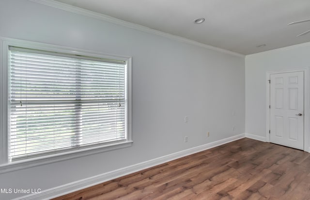 26 Old Bridge Cv, Byram, MS 39272 - empty room featuring crown molding, wood finished floors, and baseboards
