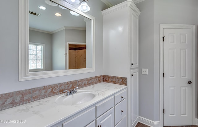 26 Old Bridge Cv, Byram, MS 39272 - bathroom featuring visible vents, baseboards, ornamental molding, recessed lighting, and vanity