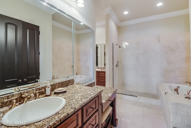 bathroom featuring vanity, shower with separate bathtub, ornamental molding, and tile patterned floors