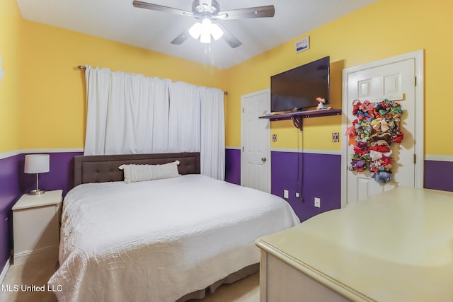 8921 Hanalei Cir, Diamondhead, MS 39525 - bedroom with ceiling fan and carpet