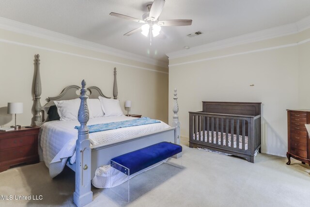 8921 Hanalei Cir, Diamondhead, MS 39525 - bedroom with ornamental molding, carpet flooring, and a ceiling fan