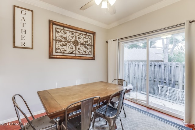 8921 Hanalei Cir, Diamondhead, MS 39525 - dining room featuring ceiling fan, crown molding, and wood finished floors