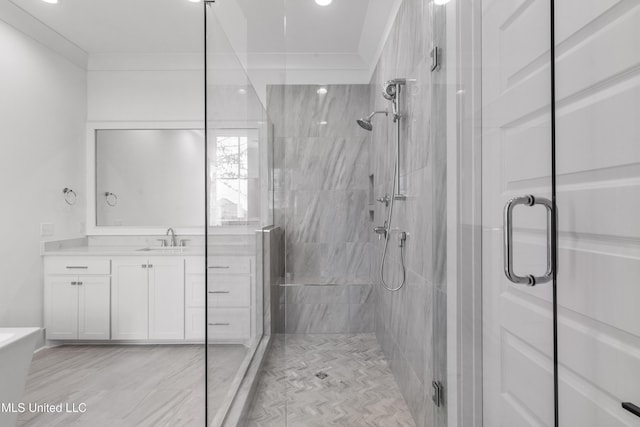 full bathroom with a stall shower and vanity