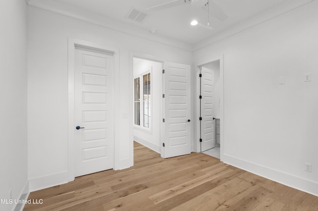 spare room with recessed lighting, a ceiling fan, baseboards, visible vents, and light wood-style floors