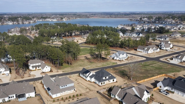 aerial view with a water view and a residential view