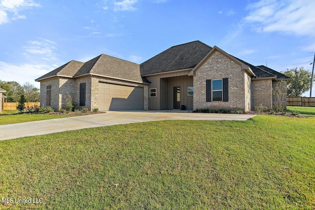 ranch-style home featuring brick siding, a front yard, driveway, and an attached garage
