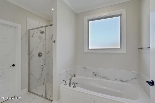 bathroom featuring separate shower and tub