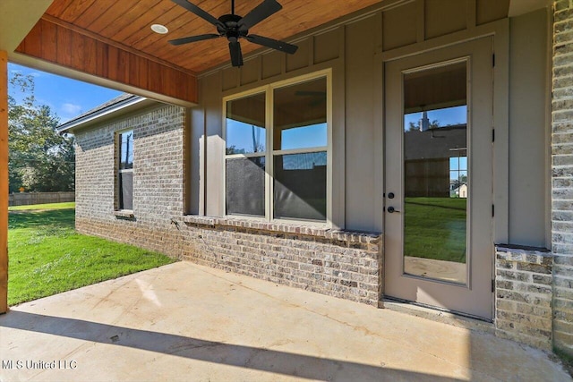 property entrance featuring a patio and ceiling fan