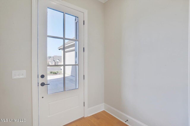 entryway featuring plenty of natural light and light wood-type flooring