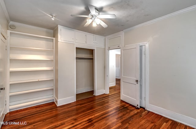 unfurnished bedroom with crown molding, ceiling fan, and dark hardwood / wood-style flooring