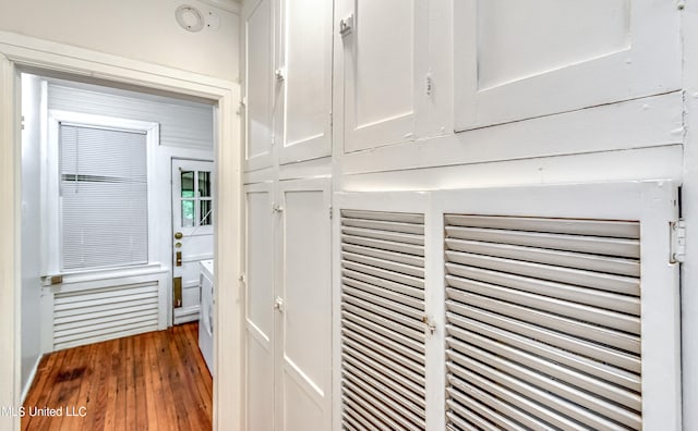 interior details featuring hardwood / wood-style flooring