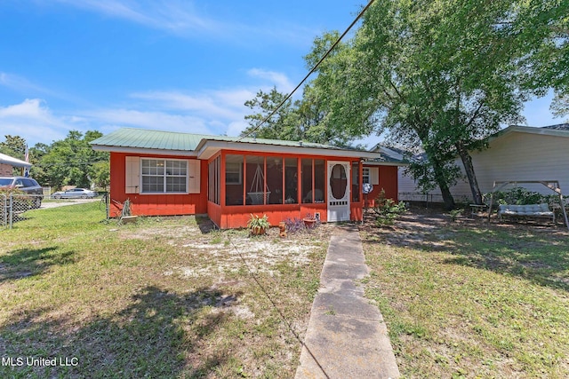 3811 16th St, Gulfport, MS 39501 - view of front of property with a sunroom and metal roof