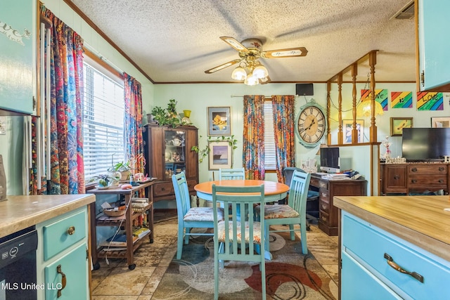3811 16th St, Gulfport, MS 39501 - dining space featuring a textured ceiling, ceiling fan, and crown molding