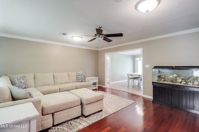 28121 Dusty Ln, Picayune, MS 39466 - living room featuring a ceiling fan, crown molding, wood finished floors, and baseboards