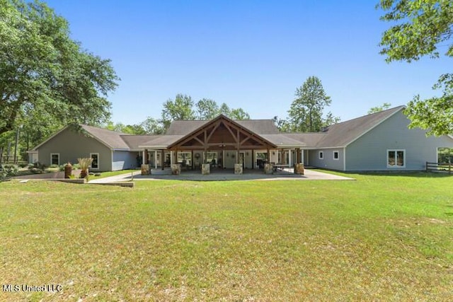 19640 Busby Rd, Vancleave, MS 39565 - rear view of property featuring a yard