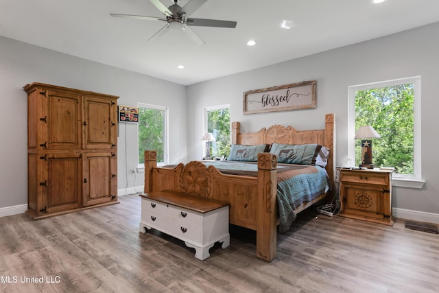 19640 Busby Rd, Vancleave, MS 39565 - bedroom with recessed lighting, light wood finished floors, visible vents, baseboards, and ceiling fan