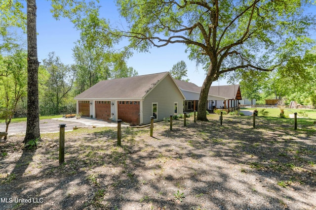 19640 Busby Rd, Vancleave, MS 39565 - view of side of home with a detached garage