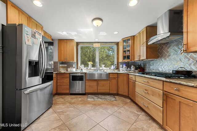 19640 Busby Rd, Vancleave, MS 39565 - kitchen with wall chimney exhaust hood, a sink, tasteful backsplash, glass insert cabinets, and appliances with stainless steel finishes