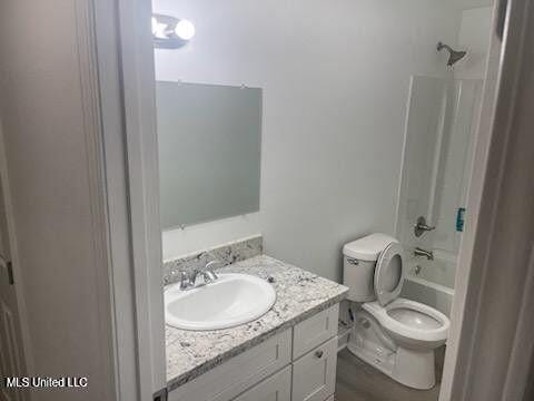 713 Cypress Ln Unit A & B, Picayune, MS 39466 - full bathroom with shower / bathing tub combination, vanity, and toilet
