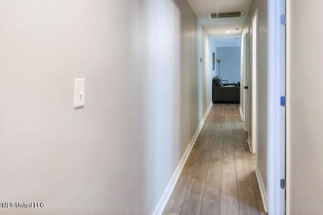 713 Cypress Ln Unit A & B, Picayune, MS 39466 - hallway featuring light wood-type flooring