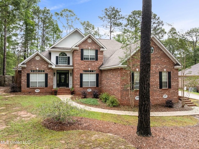 32 Cambrooke, Hattiesburg, MS 39402 - traditional-style home featuring brick siding and roof with shingles