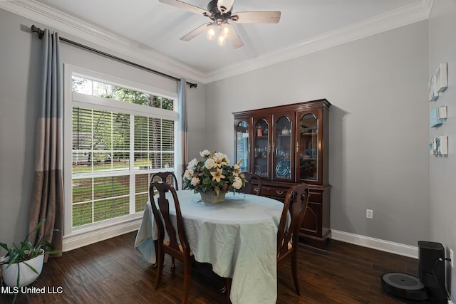 32 Cambrooke, Hattiesburg, MS 39402 - dining room featuring crown molding, healthy amount of natural light, baseboards, and dark wood-style flooring