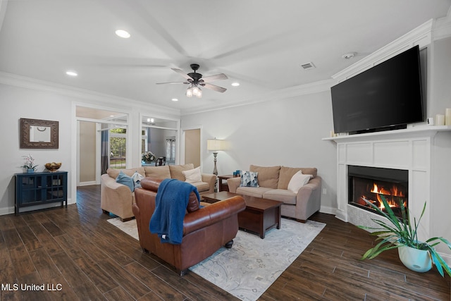 32 Cambrooke, Hattiesburg, MS 39402 - living room featuring a fireplace with flush hearth, a ceiling fan, wood finished floors, recessed lighting, and crown molding