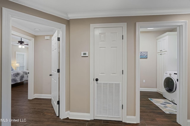 32 Cambrooke, Hattiesburg, MS 39402 - hallway with washer / clothes dryer, dark wood finished floors, baseboards, and ornamental molding