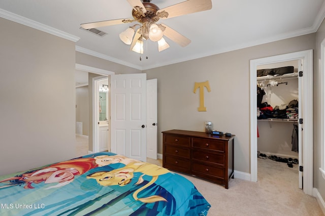 32 Cambrooke, Hattiesburg, MS 39402 - bedroom featuring a closet, a walk in closet, crown molding, light colored carpet, and a ceiling fan