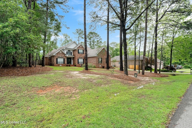 32 Cambrooke, Hattiesburg, MS 39402 - traditional-style house with brick siding and a front yard