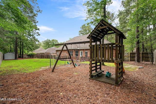 32 Cambrooke, Hattiesburg, MS 39402 - view of play area featuring a storage shed and an outdoor structure