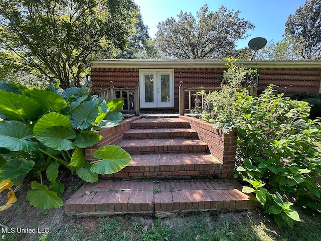 entrance to property with french doors