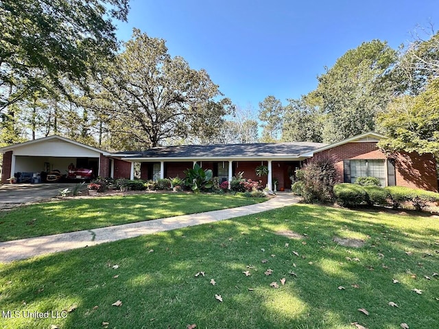 ranch-style home with a carport and a front lawn