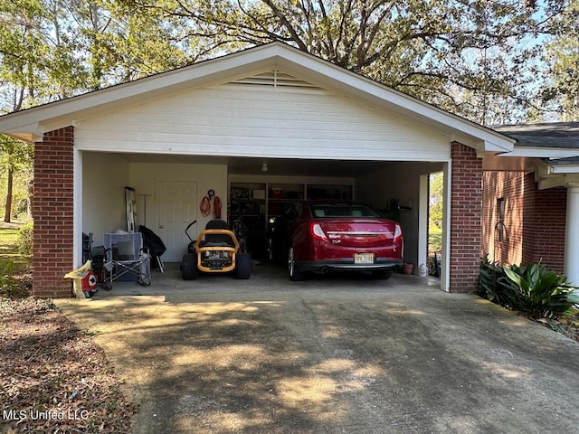 garage featuring a carport