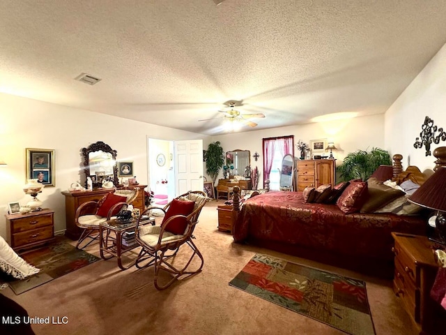 bedroom with carpet, a textured ceiling, and ceiling fan