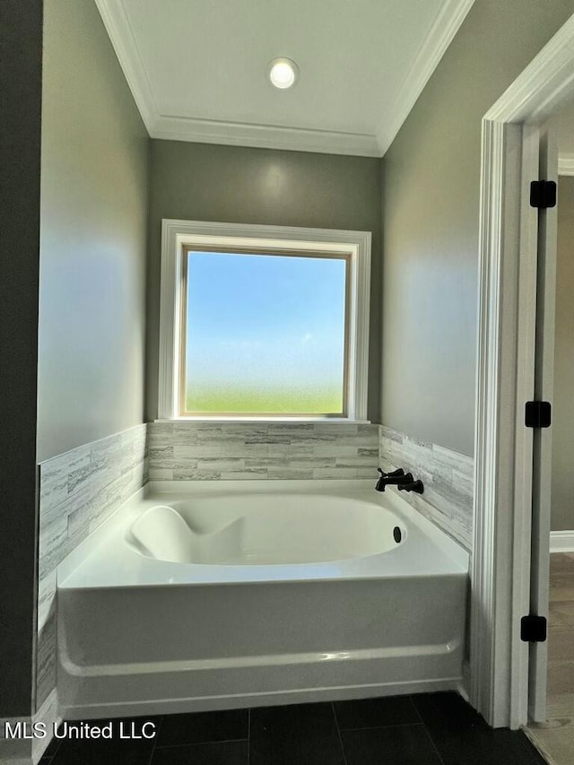 113 River Bend Ave, Vidalia, LA 71373 - bathroom featuring ornamental molding, plenty of natural light, and a bath