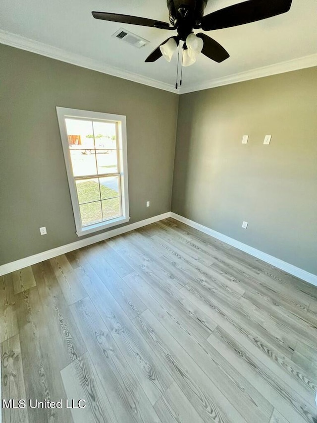 113 River Bend Ave, Vidalia, LA 71373 - spare room with light wood-style flooring, visible vents, and ornamental molding